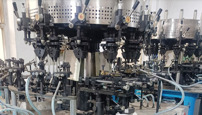 Pharmaceutical glass vial forming machine